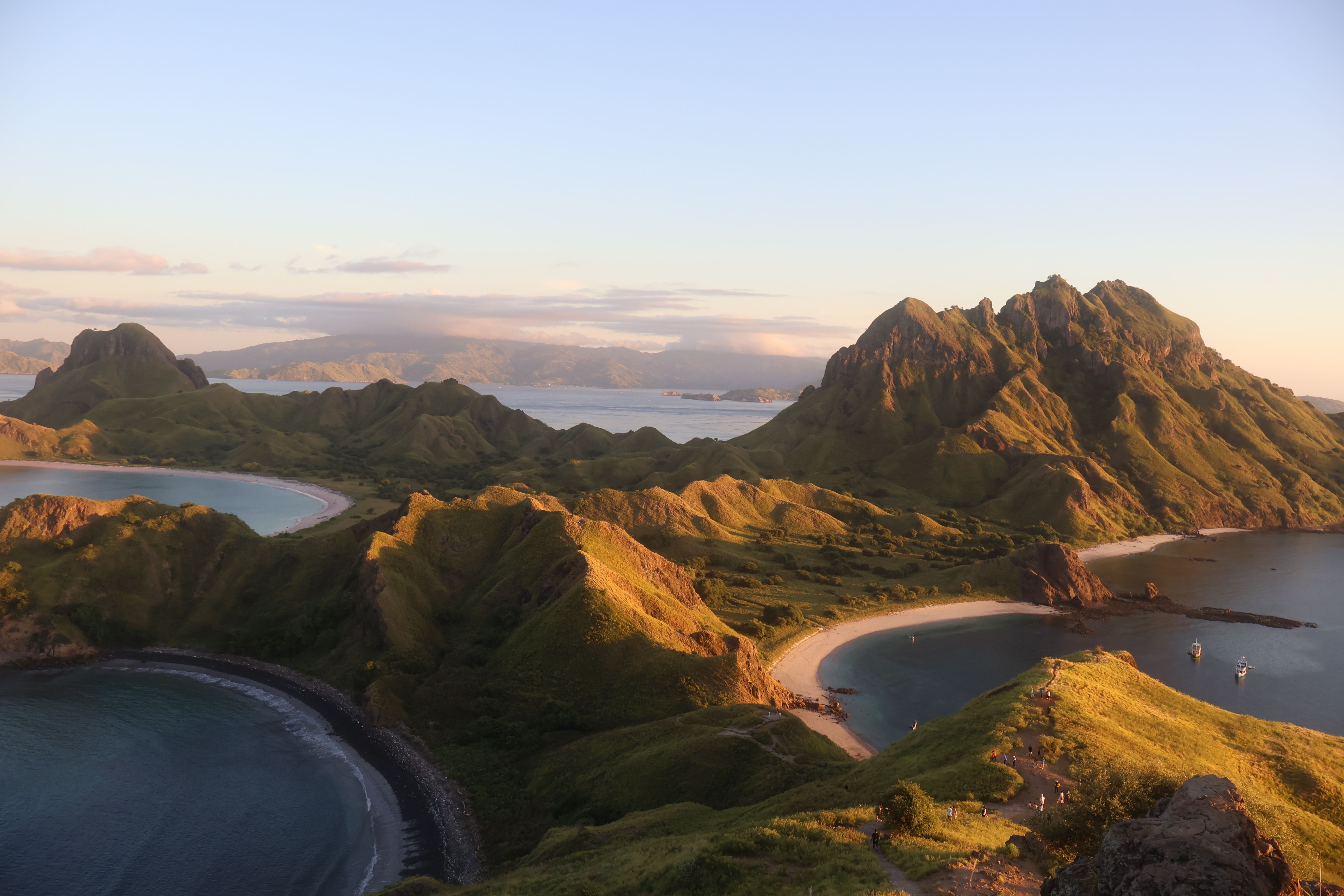 Aerial shot of islands surrounded by beaches and blue water